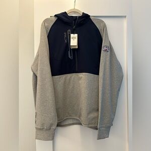 Men’s RLX 1/4 zip hoodie with tournament logo